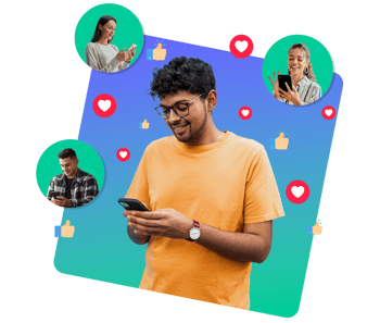 smiling man looking at mobile phone